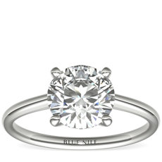 Petite Solitaire Engagement Ring in Platinum